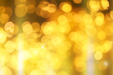Image of Beautiful abstract background with defocused golden lights