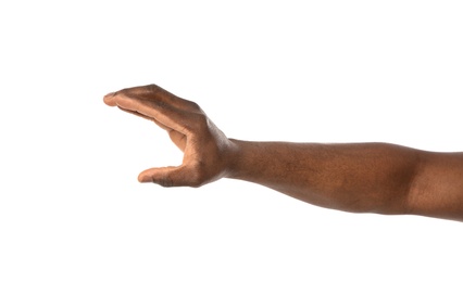 African-American man holding something in hand on white background, closeup