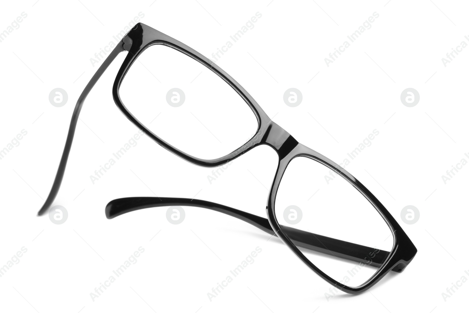 Photo of Stylish glasses with black frame isolated on white