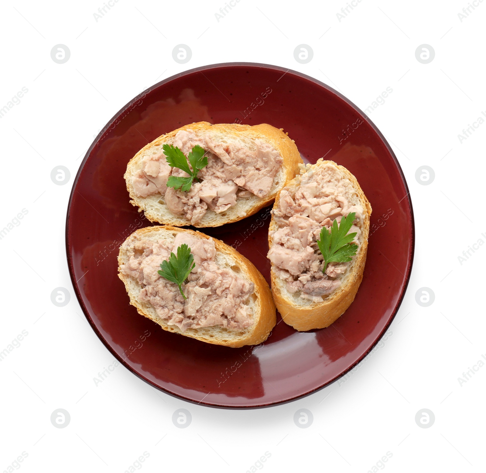 Photo of Tasty sandwiches with cod liver and fresh parsley isolated on white, top view