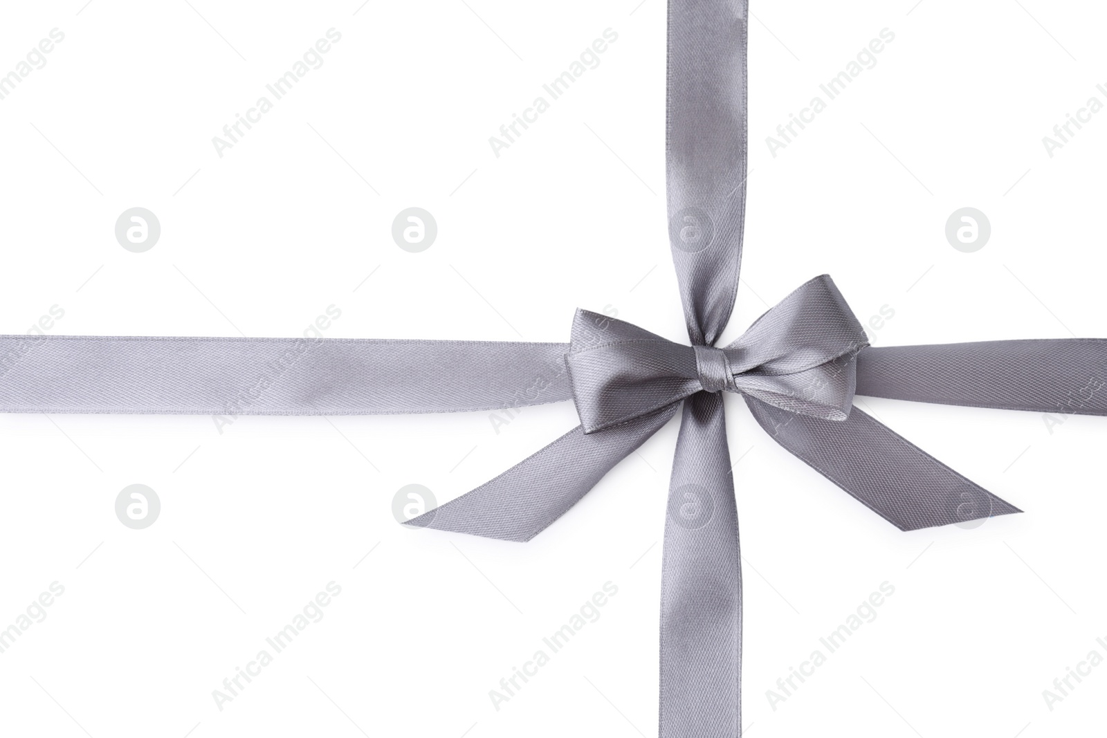 Photo of Grey satin ribbon with bow on white background, top view
