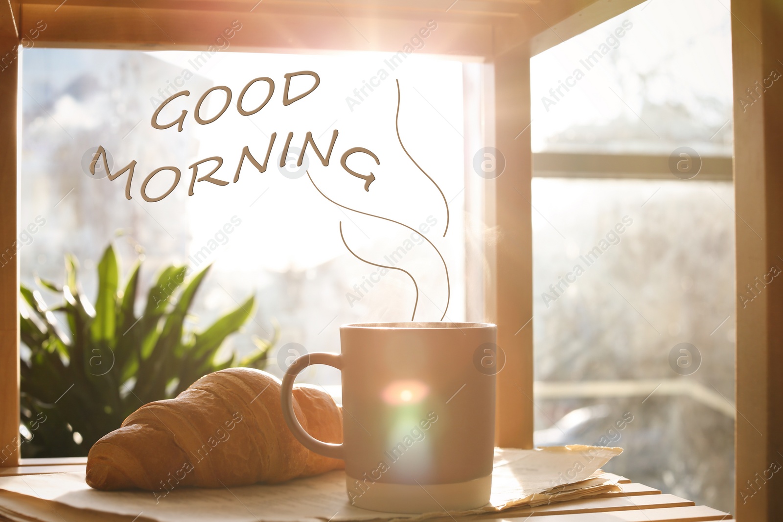 Image of Good Morning! Delicious coffee, newspaper and croissant near window indoors