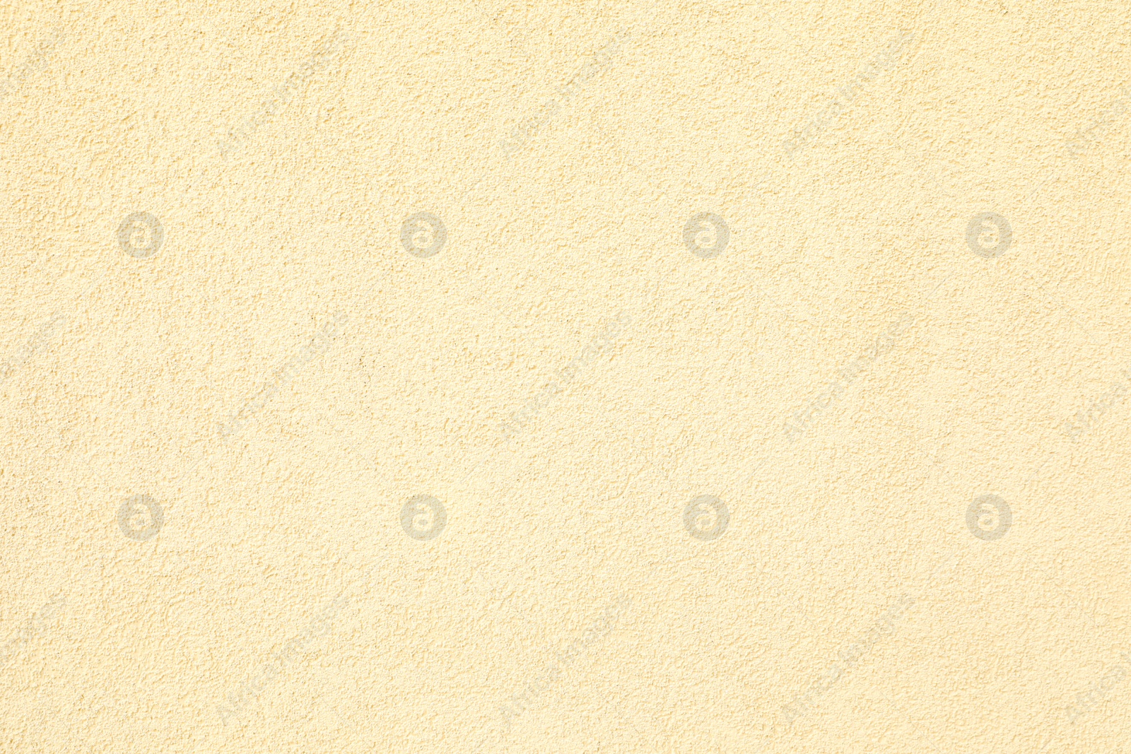 Photo of Texture of beige plaster wall as background