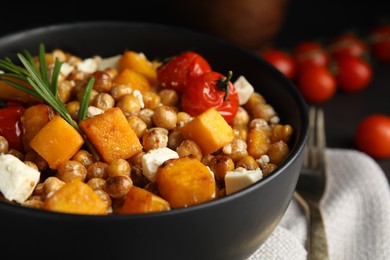 Photo of Delicious fresh chickpea salad on table, closeup