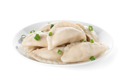 Photo of Plate of tasty cooked dumplings with green onion isolated on white
