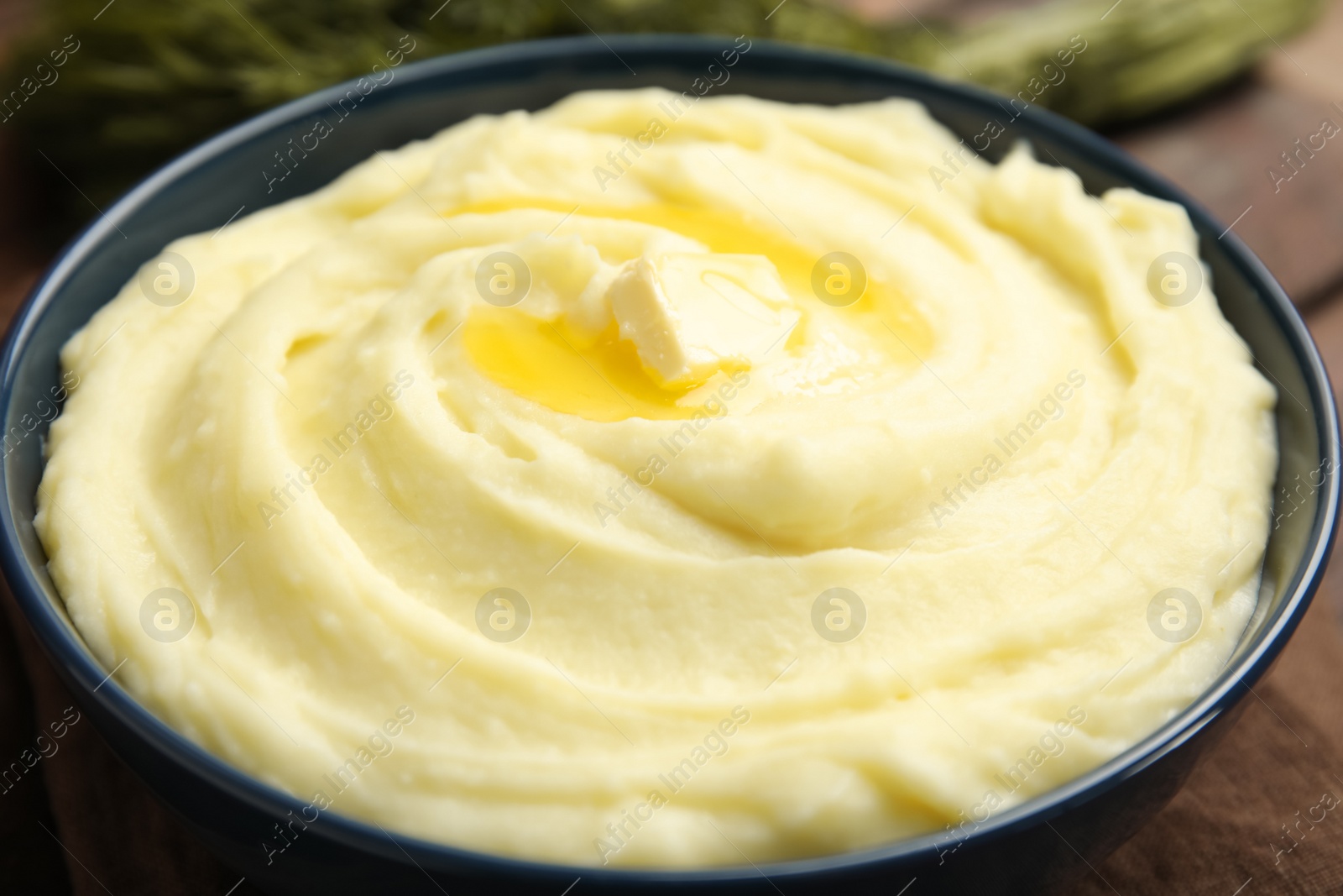 Photo of Bowl of freshly cooked homemade mashed potatoes, closeup
