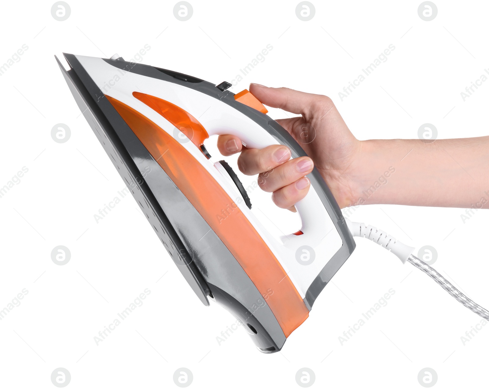 Photo of Woman holding modern electric iron on white background, closeup