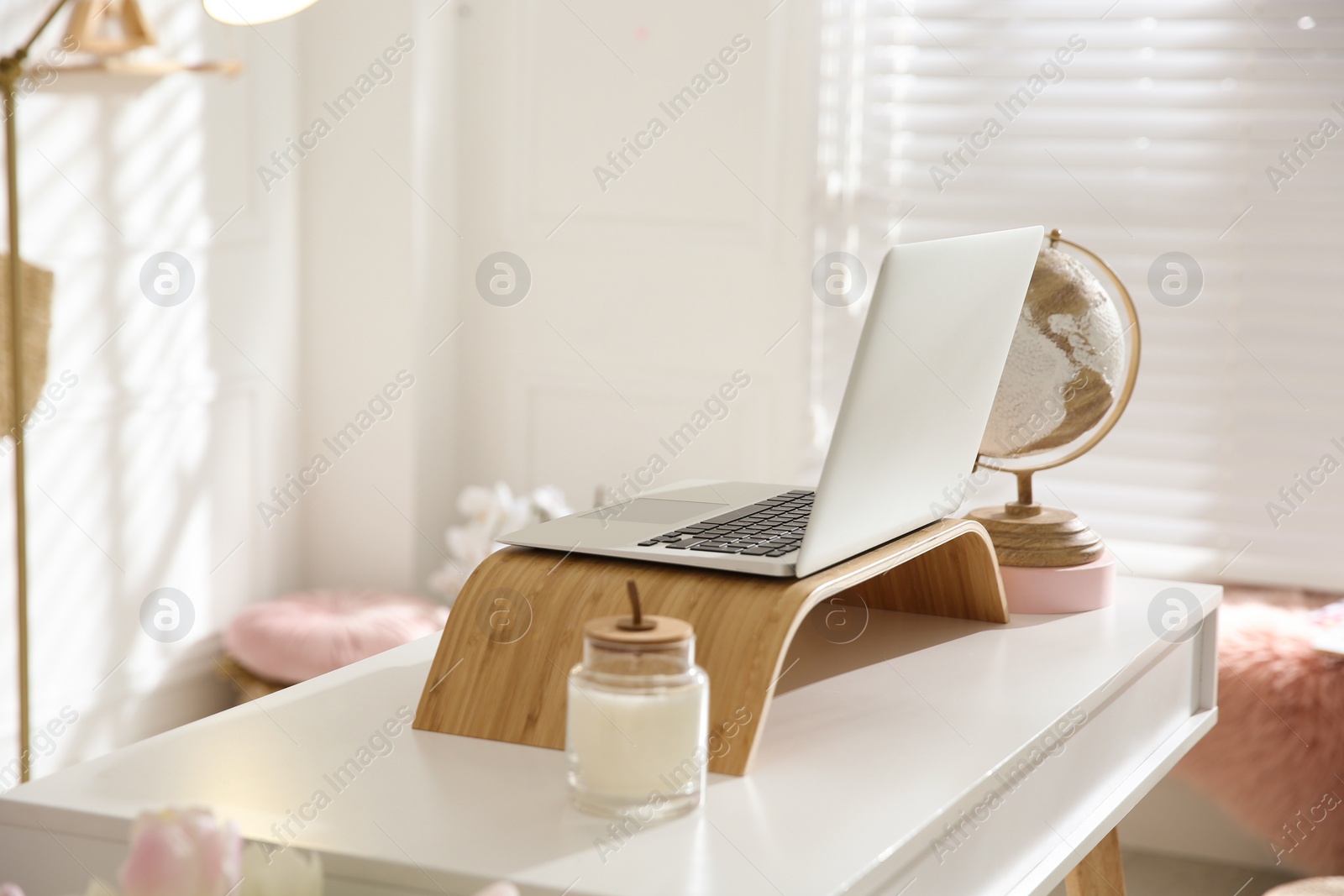 Photo of Stylish home office interior with comfortable workplace