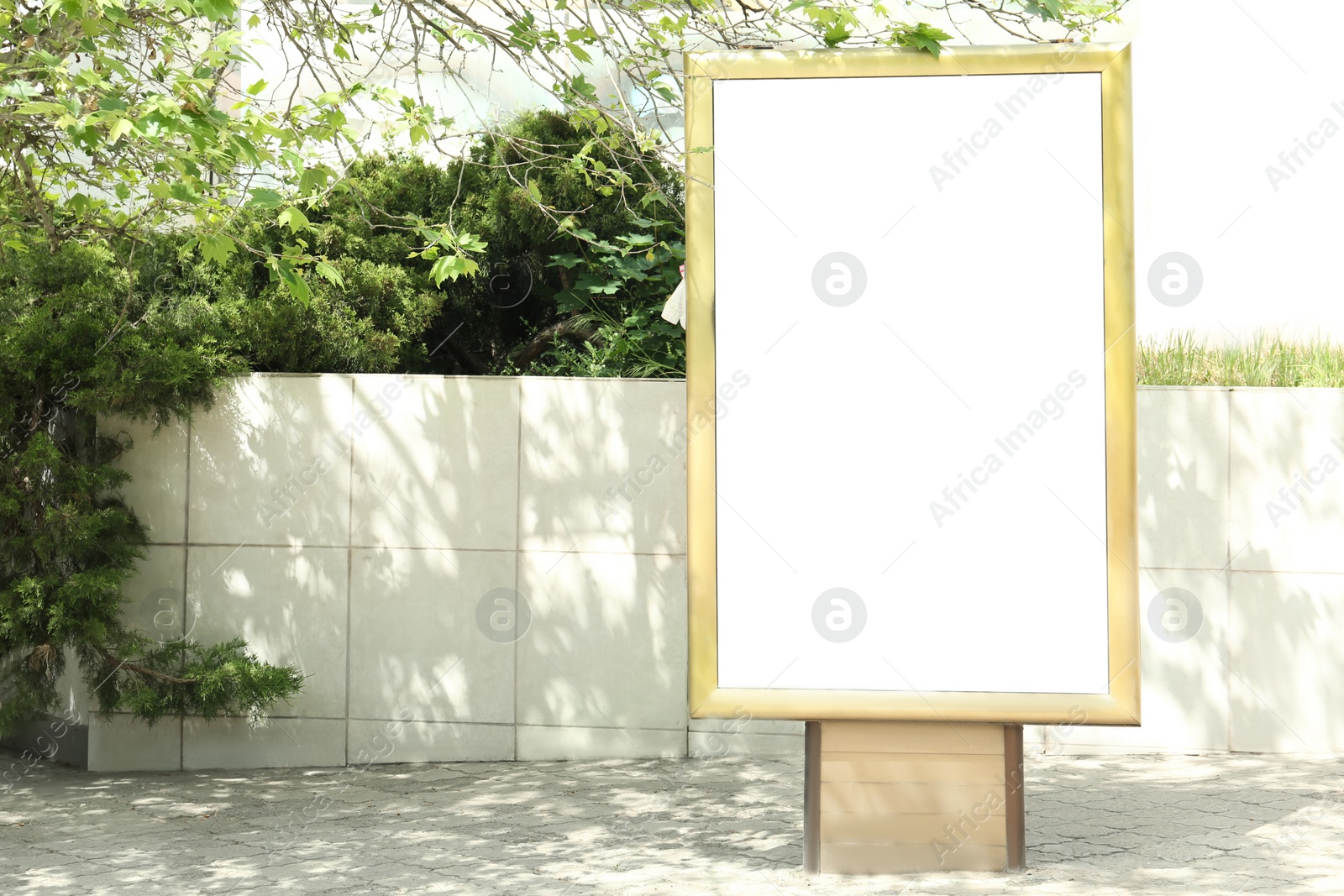 Photo of Blank citylight poster outdoors. Advertising board design