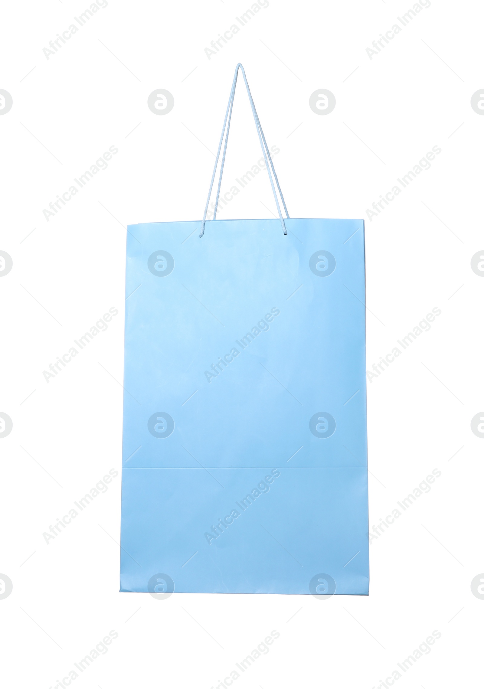 Photo of One light blue shopping bag isolated on white