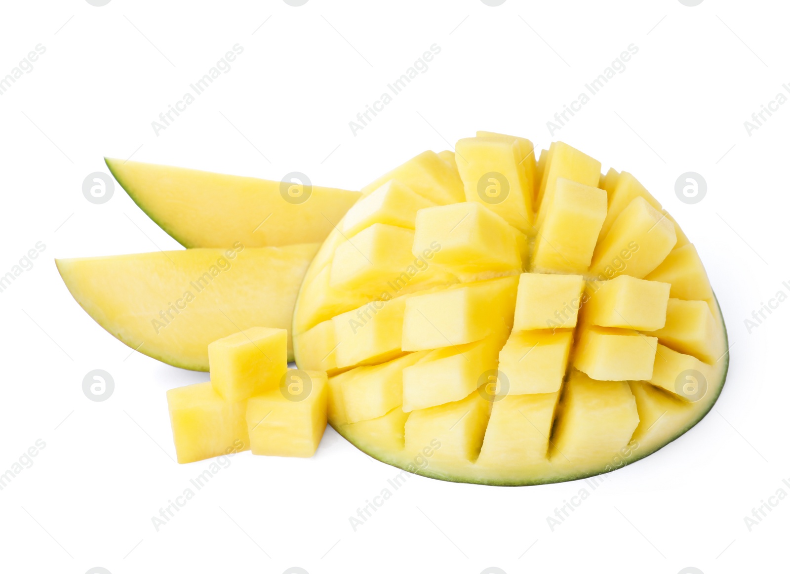 Photo of Delicious ripe mango cut into cubes and slices isolated on white