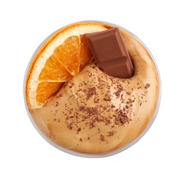 Glass of delicious dalgona coffee with dry orange and chocolate isolated on white, top view