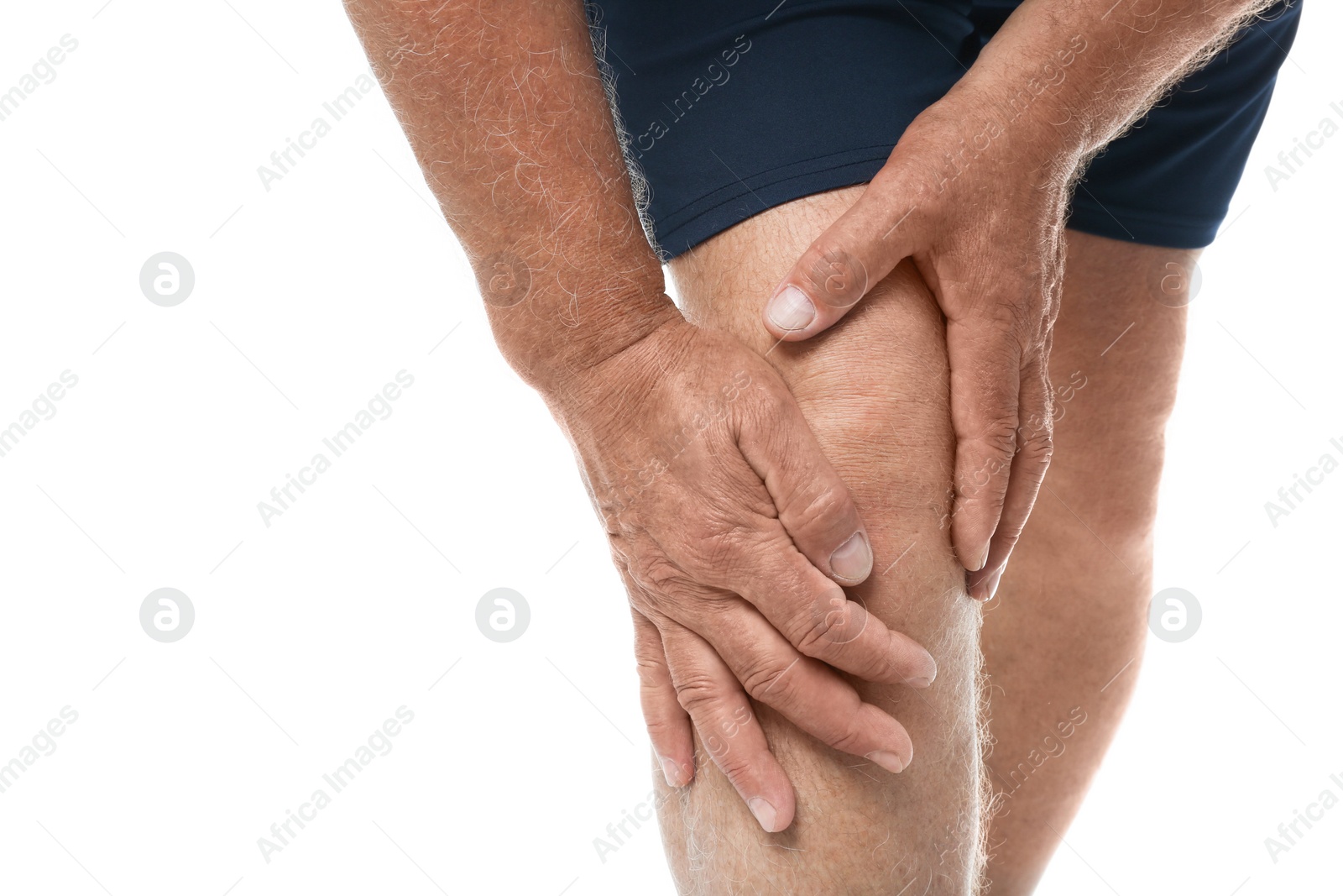 Photo of Senior man having knee problems on white background, closeup