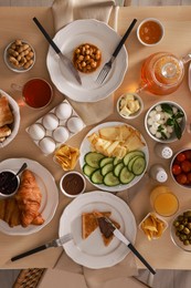 Photo of Dishes with different food on table, flat lay. Luxury brunch