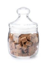 Photo of Glass jar with brown sugar cubes isolated on white