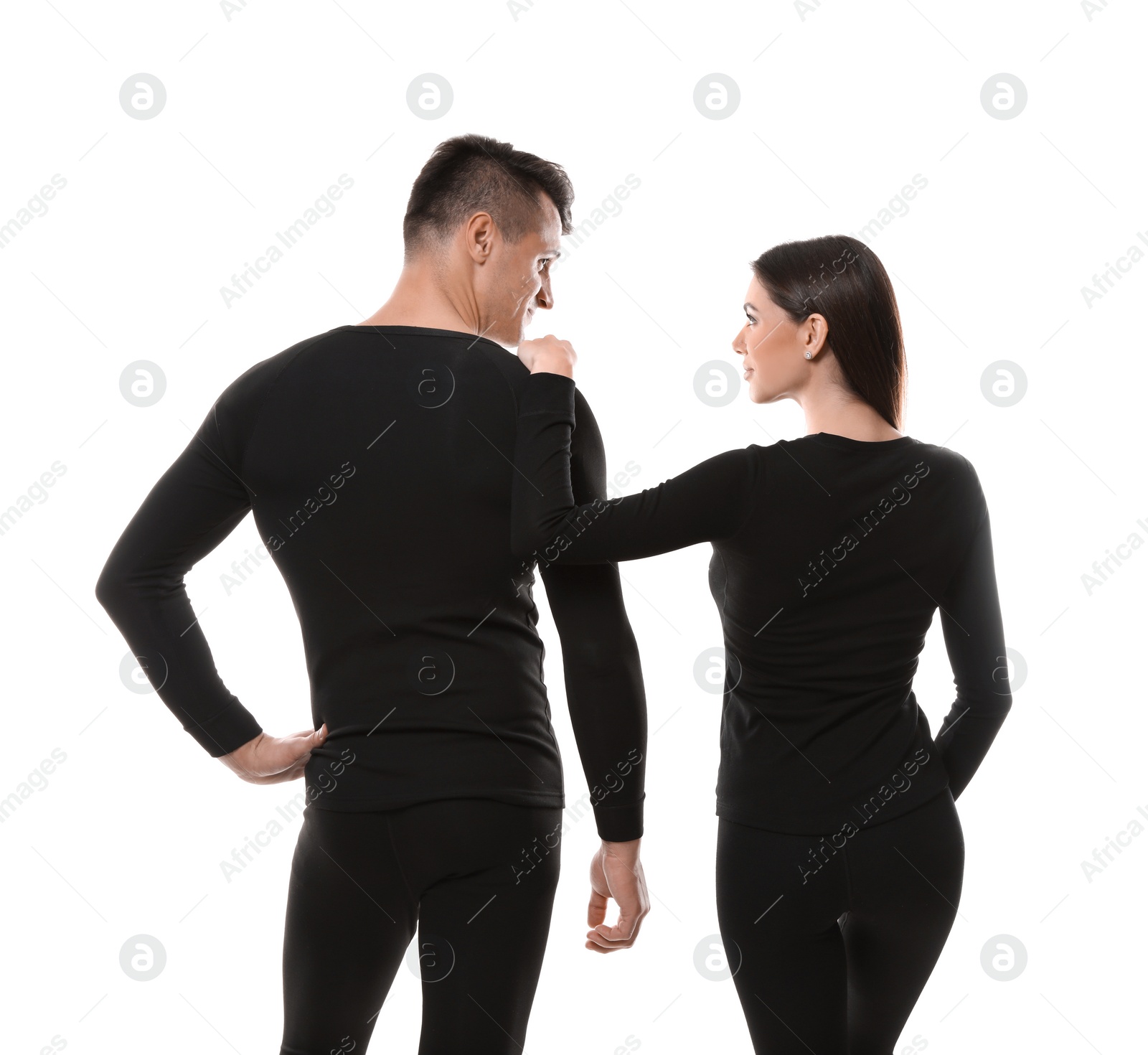Photo of Couple wearing thermal underwear isolated on white, back view