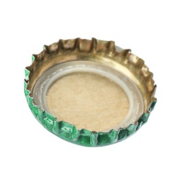 Photo of One green beer bottle cap isolated on white