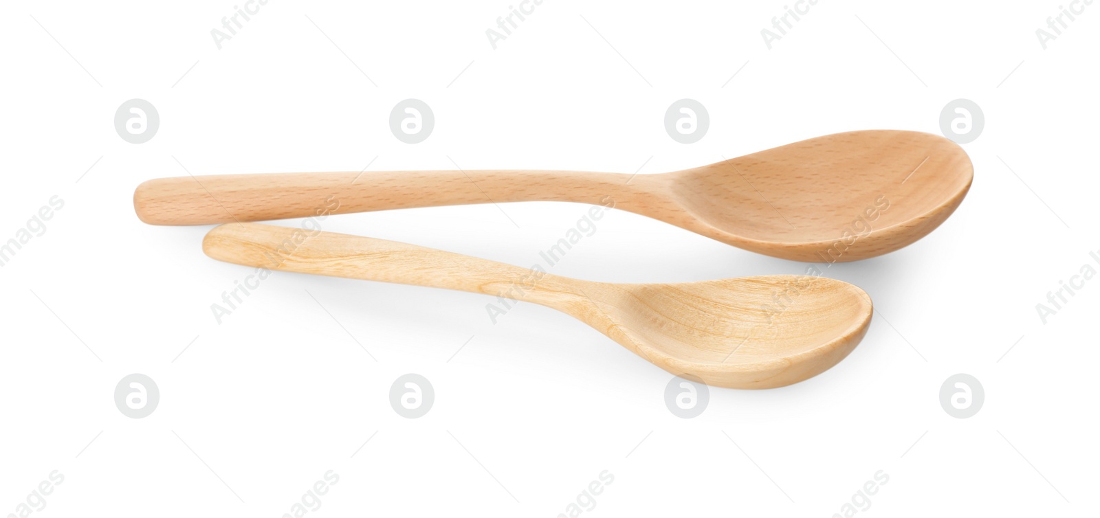 Photo of Two empty wooden spoons isolated on white