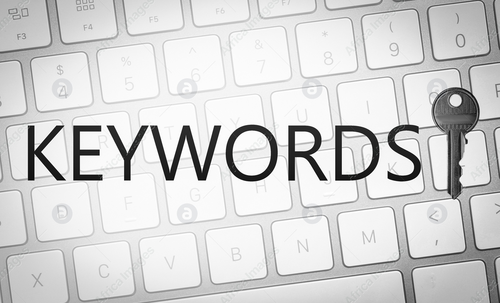 Image of Word Keywords, key and computer keyboard. SEO direction