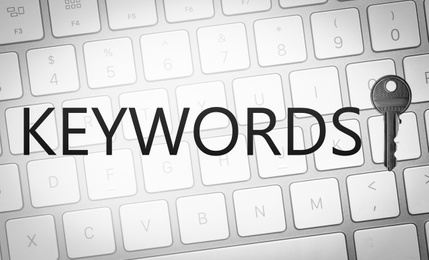 Image of Word Keywords, key and computer keyboard. SEO direction