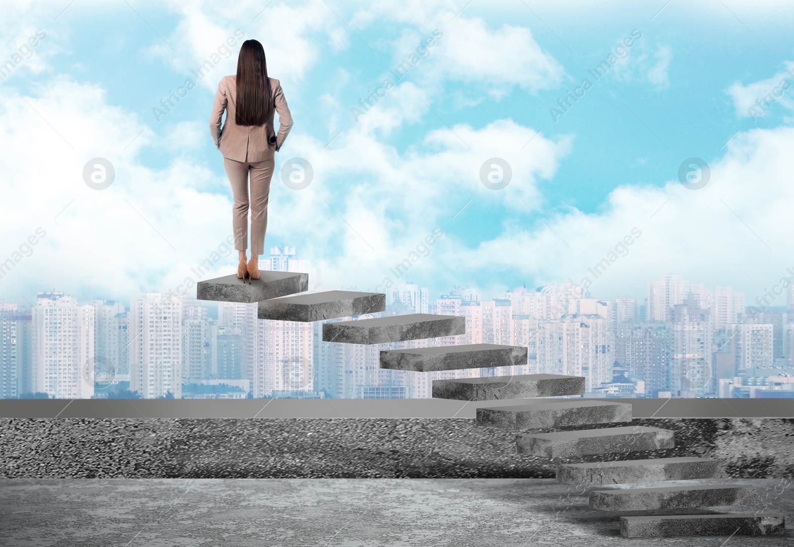 Image of Woman standing on top of stairs and looking at cityscape. Way to success