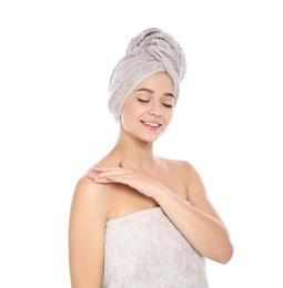 Photo of Portrait of young pretty woman with towels on white background