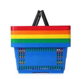 Photo of Colorful plastic shopping baskets on white background