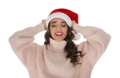 Photo of Beautiful young woman wearing warm sweater and Santa hat on white background. Christmas party