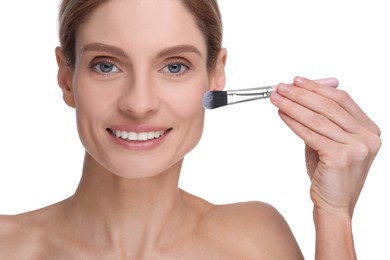 Photo of Woman with makeup brush on white background