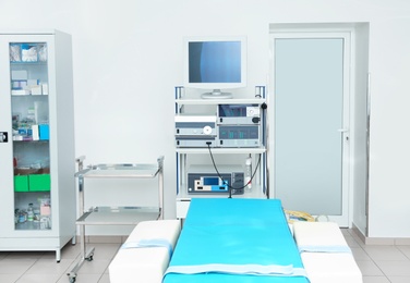Interior of diagnostic room with modern equipment in clinic