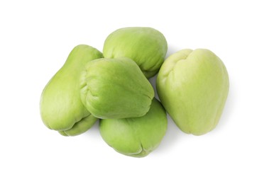 Photo of Many fresh green chayote isolated on white, top view