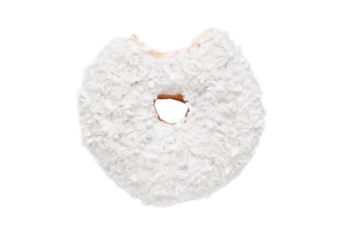 Tasty bitten glazed donut decorated with coconut shavings isolated on white, top view