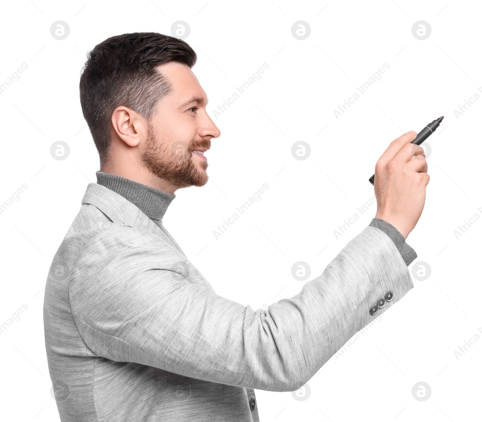 Photo of Handsome bearded businessman with marker on white background