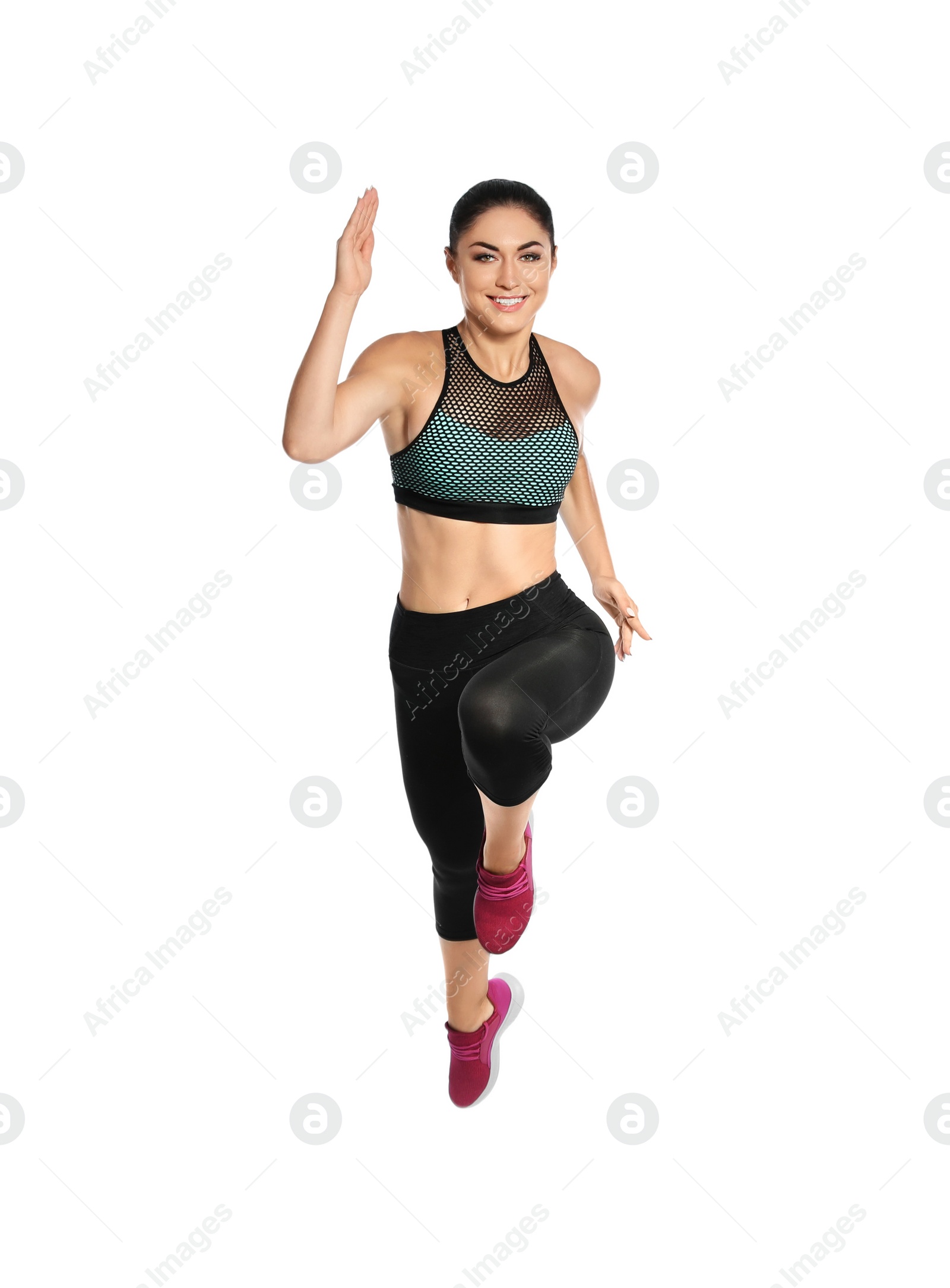 Photo of Sporty young woman running on white background