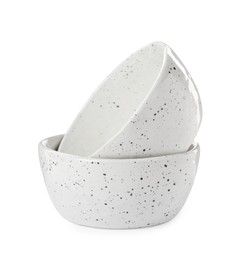 Beautiful empty ceramic bowls on white background