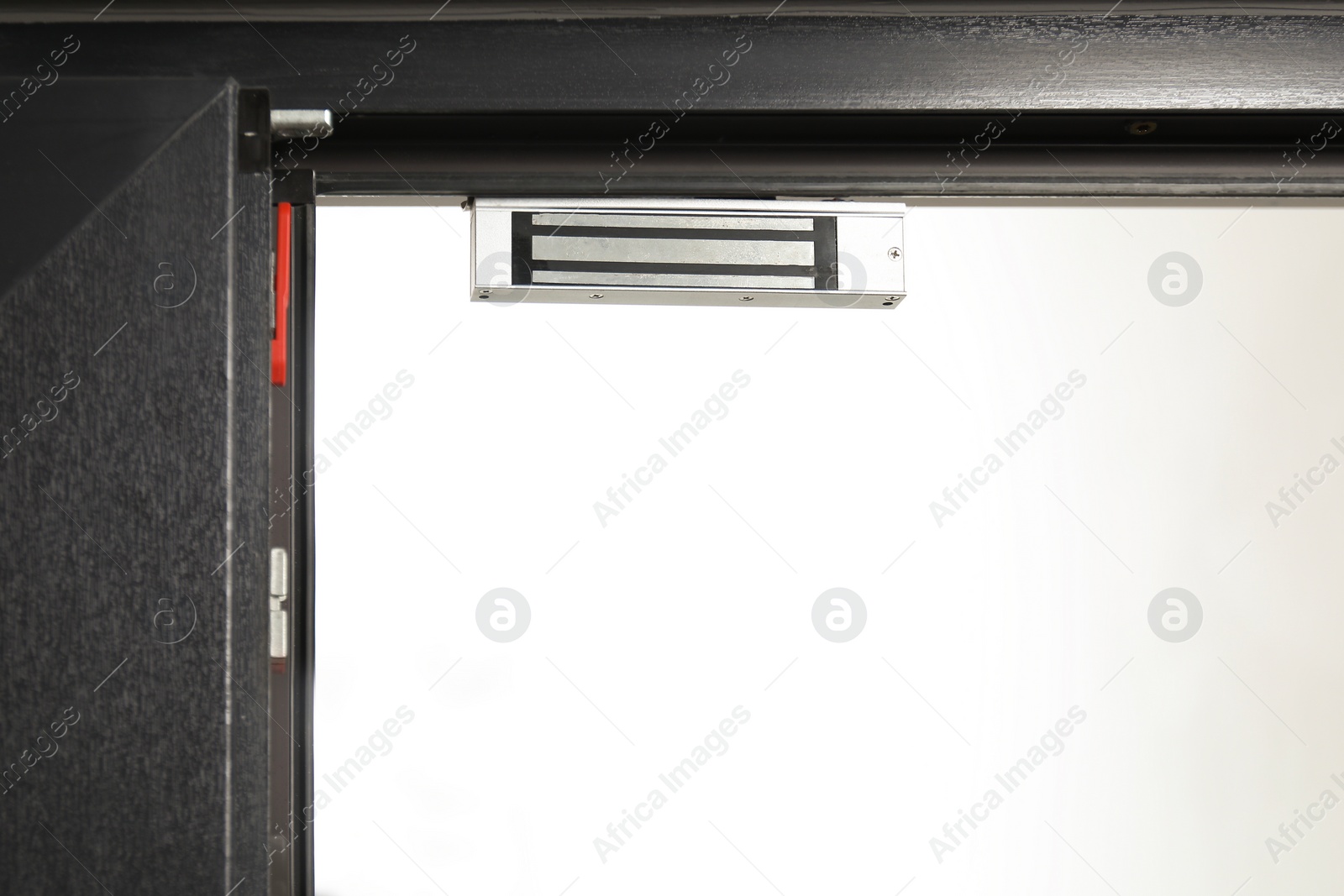 Photo of Electromagnetic door lock indoors, closeup. Home security