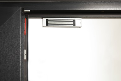 Electromagnetic door lock indoors, closeup. Home security