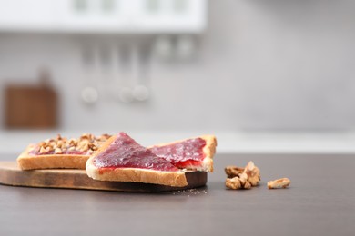 Delicious toasts on counter in kitchen, space for text