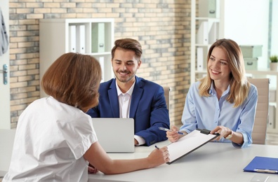 Human resources commission conducting job interview with applicant in office