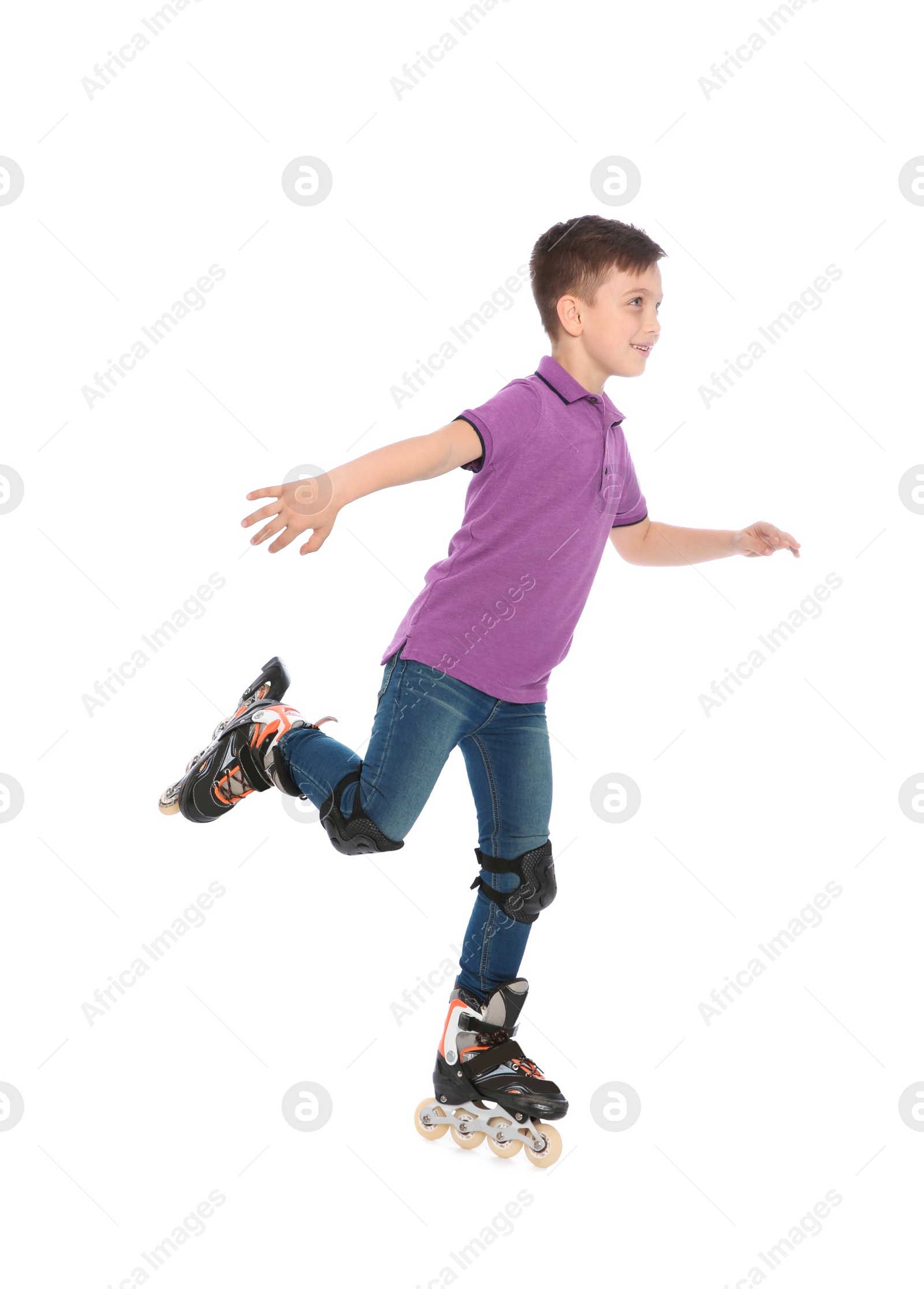 Photo of Little boy with inline roller skates on white background