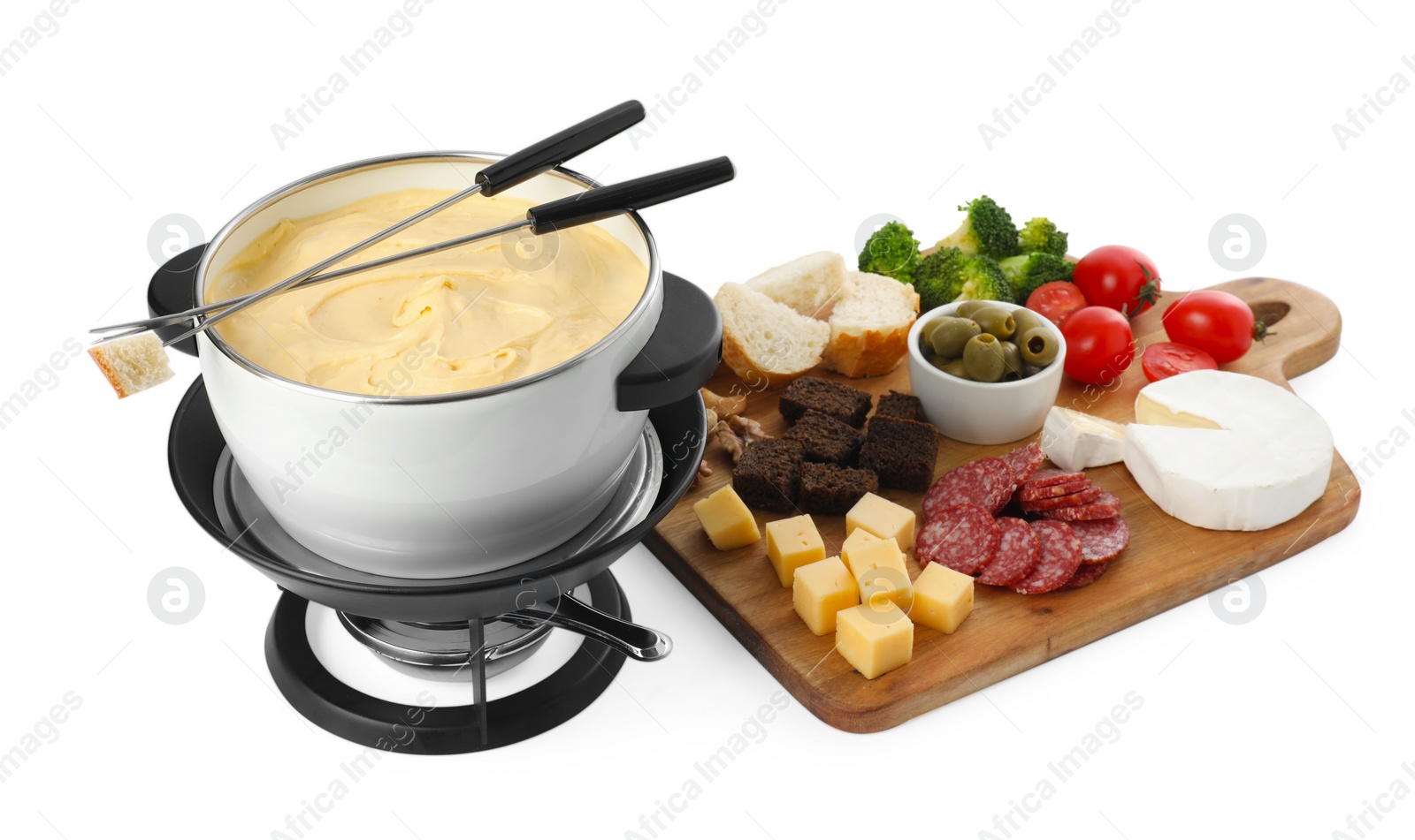 Photo of Fondue with tasty melted cheese, forks and different snacks isolated on white