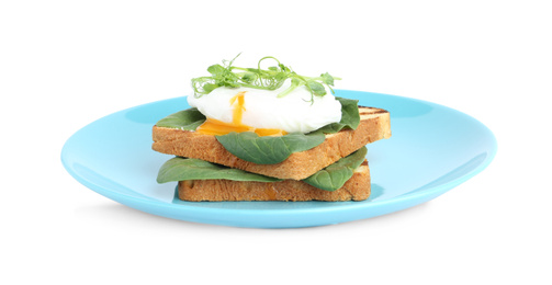 Delicious poached egg sandwich isolated on white