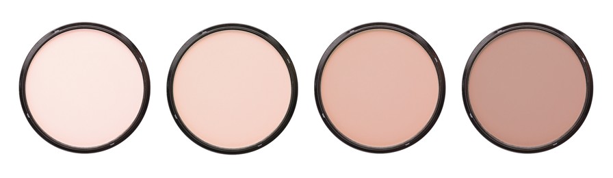 Compact face powders of different shades isolated on white, collection. Top view