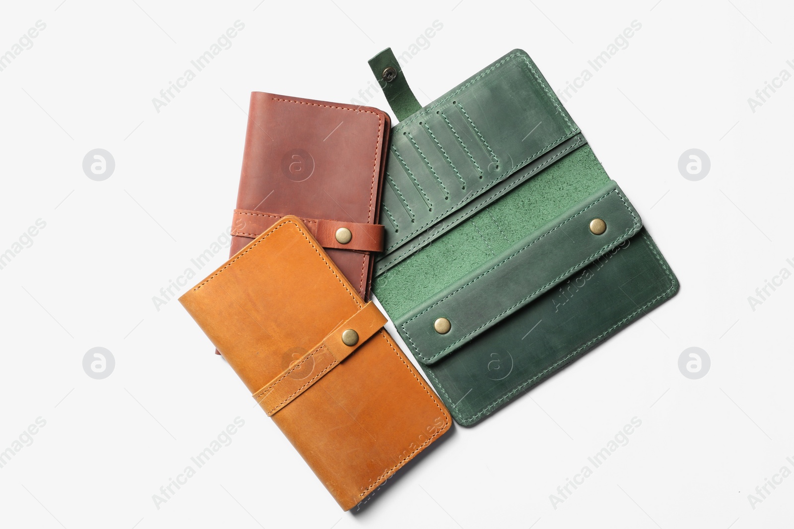 Photo of Stylish wallets on white background, top view