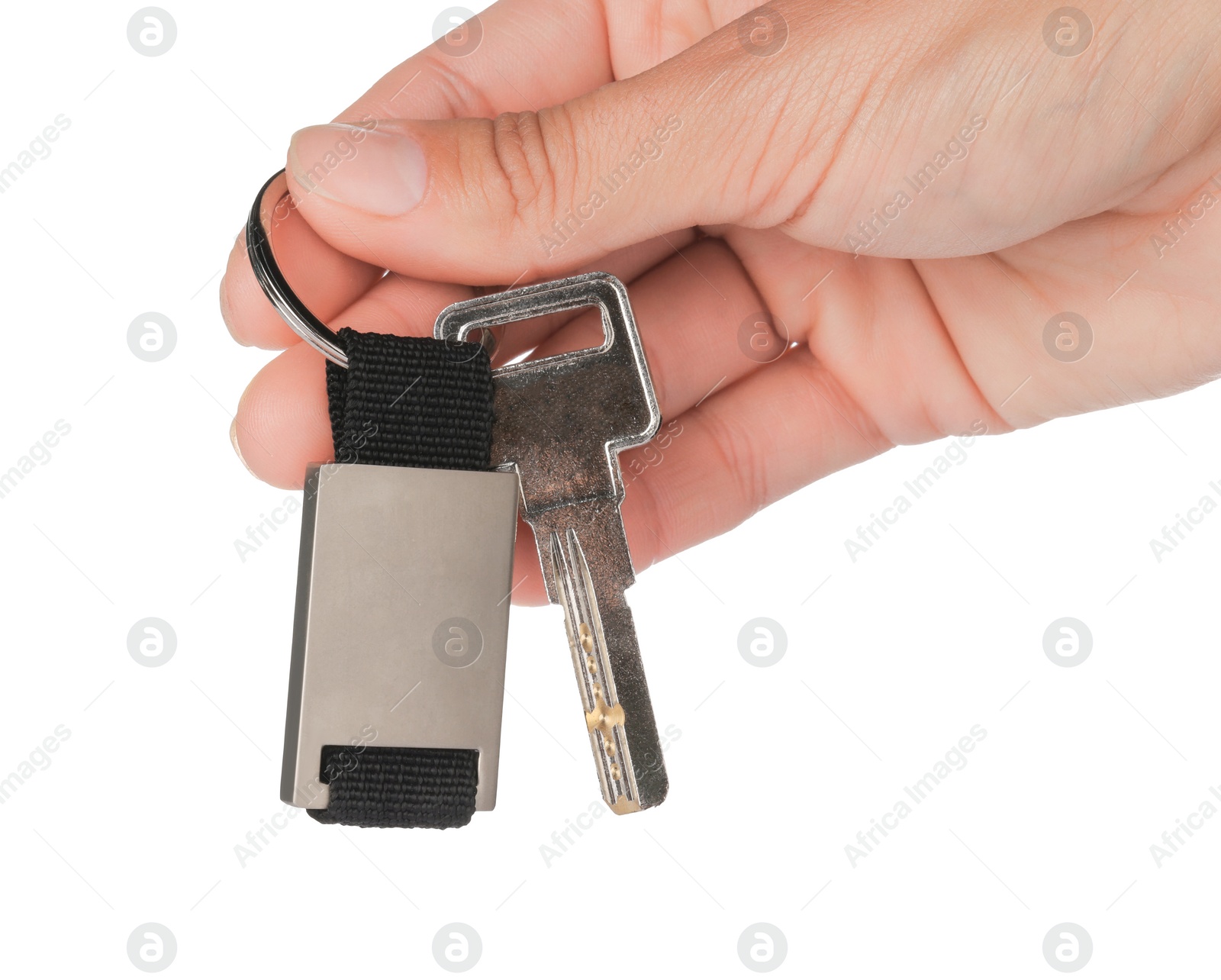 Photo of Woman holding key with metallic keychain on white background, closeup