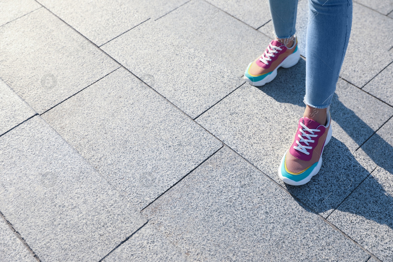 Photo of Woman on stairs outdoors, closeup with space for text. Choosing way concept.