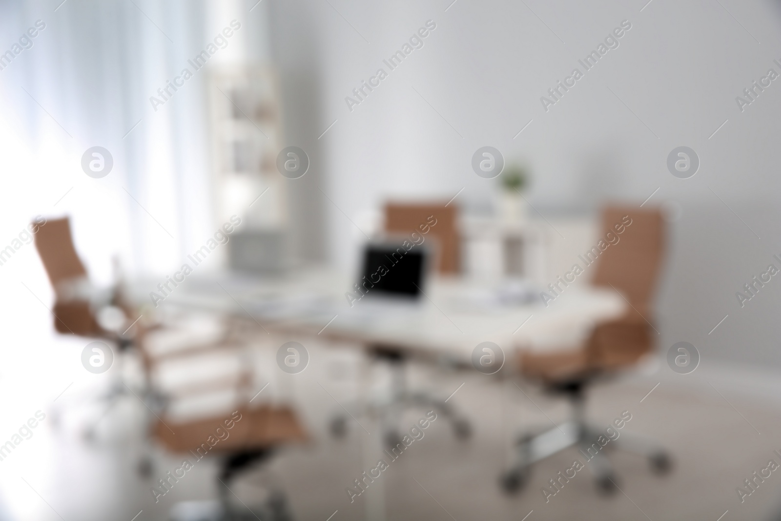 Photo of Modern brightly lit office with bokeh effect