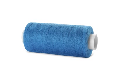 Photo of Spool of light blue sewing thread isolated on white