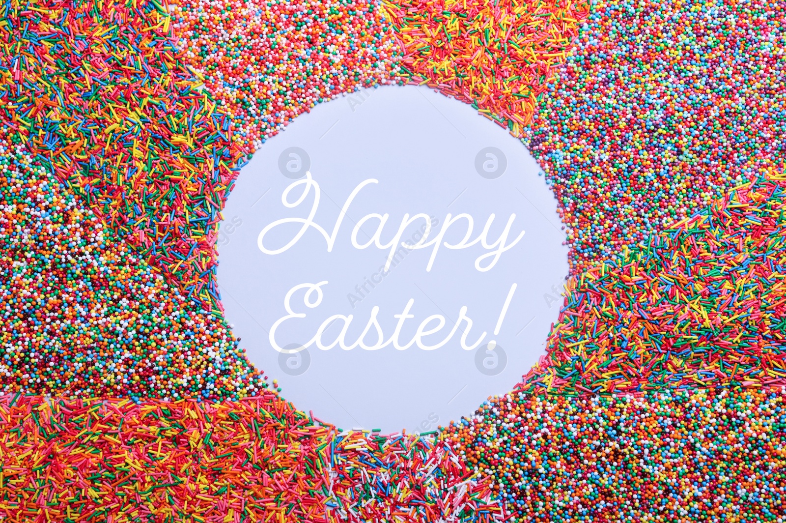 Image of Text Happy Easter and frame of colorful sprinkles on light blue background, flat lay. Confectionery decor