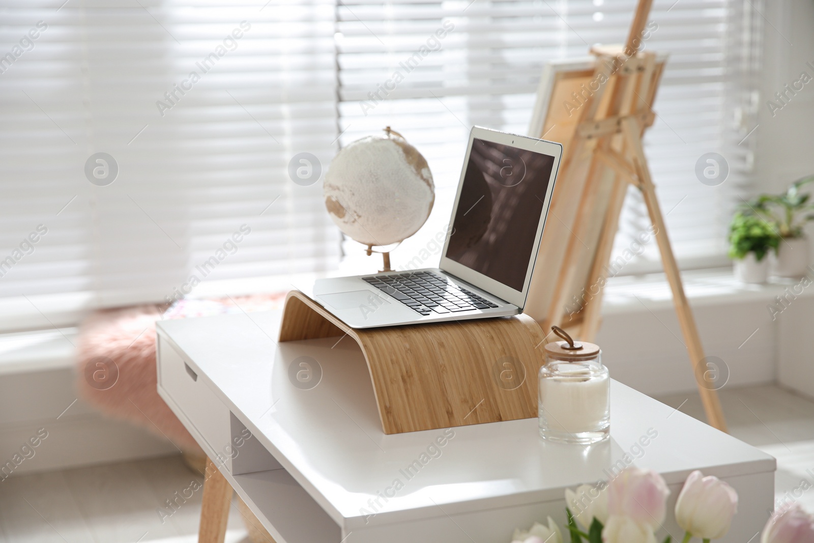 Photo of Stylish home office interior with comfortable workplace